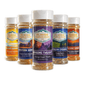 Collection of Flavor Expedition Co. spice jars with various labels on a black background