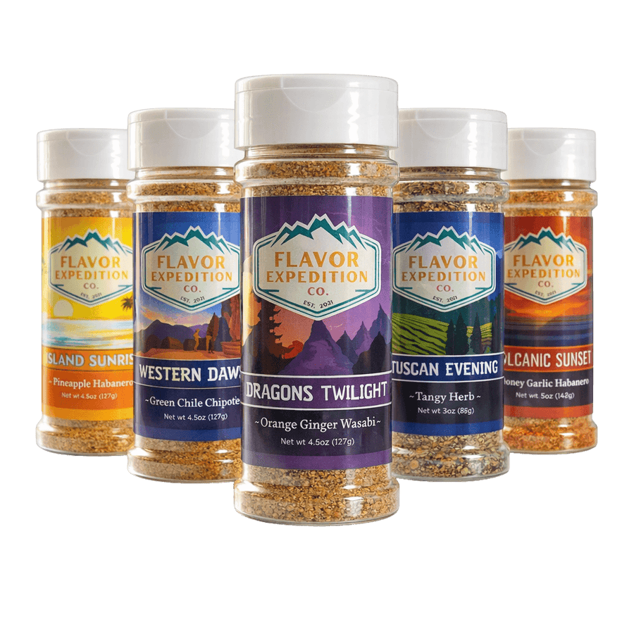 Collection of Flavor Expedition Co. spice jars with various labels on a black background