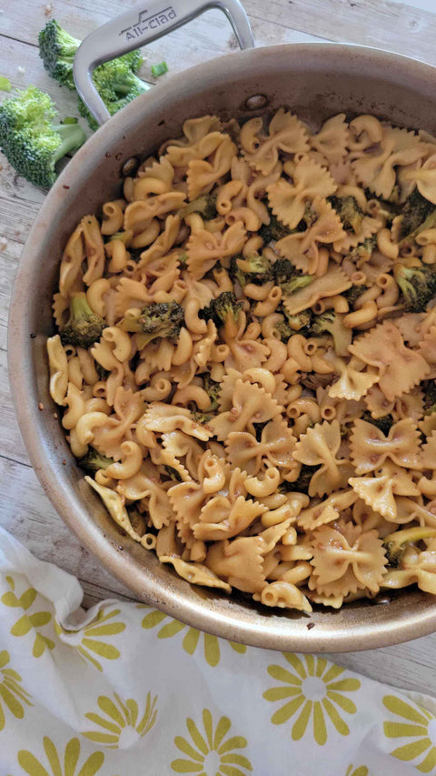Garlic Broccoli Stir-Fry with bowtie pasta and broccoli in a large pot.