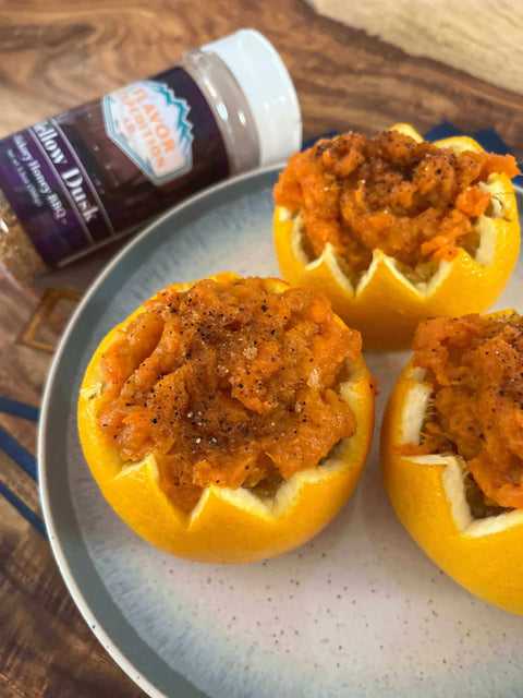 Smoky Sweet Potato in Citrus Cups topped with Mellow Dusk seasoning on a plate, showcasing a delicious recipe.