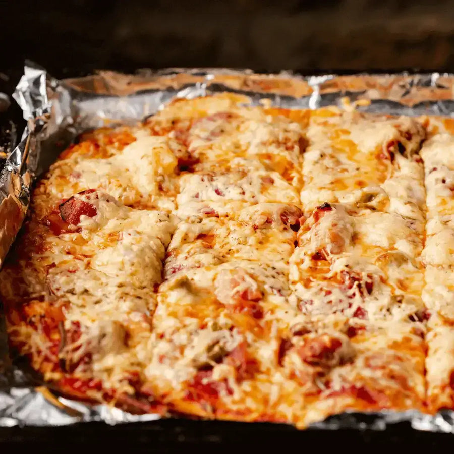 Make-Ahead Lasagna for Postpartum (or Tuesday Nights) fresh out of the oven, gooey cheese and delicious layers.