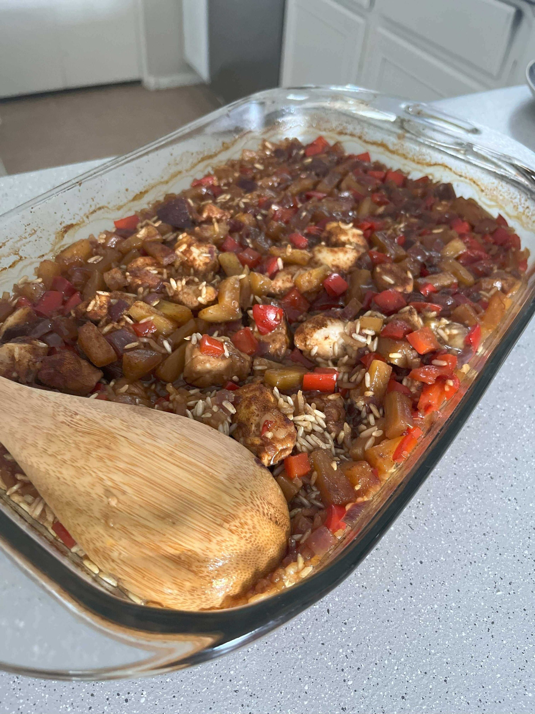 Aloha Chicken Casserole with juicy chicken, peppers, and rice in a glass dish, ready to delight your taste buds.