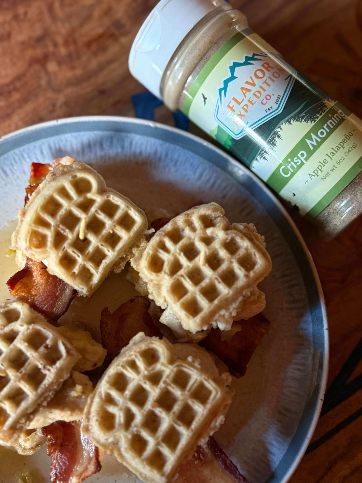 Apple Jalapeño Chicken Waffle Sliders served with Crisp Morning seasoning on a plate.