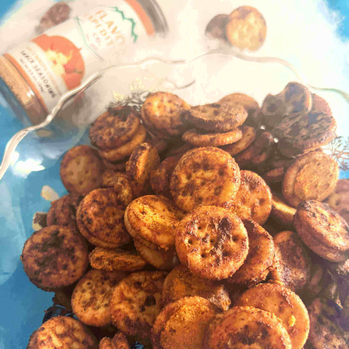 A close-up of Spicy White Cheddar Cheese Cracker Sandwiches piled in a bowl, perfect for snacking.