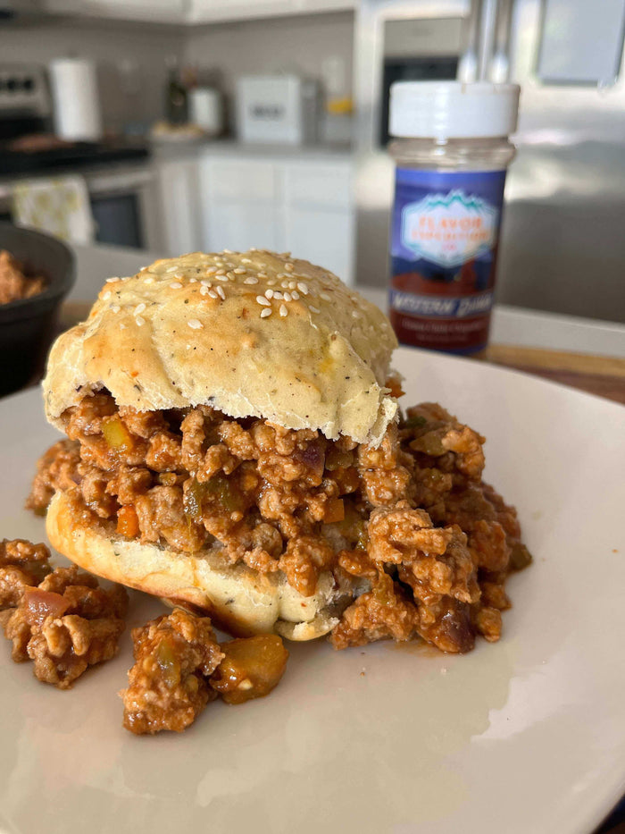Delicious Green Chile Turkey Sloppy Joes served on a sesame bun, showcasing bold smoky flavors.