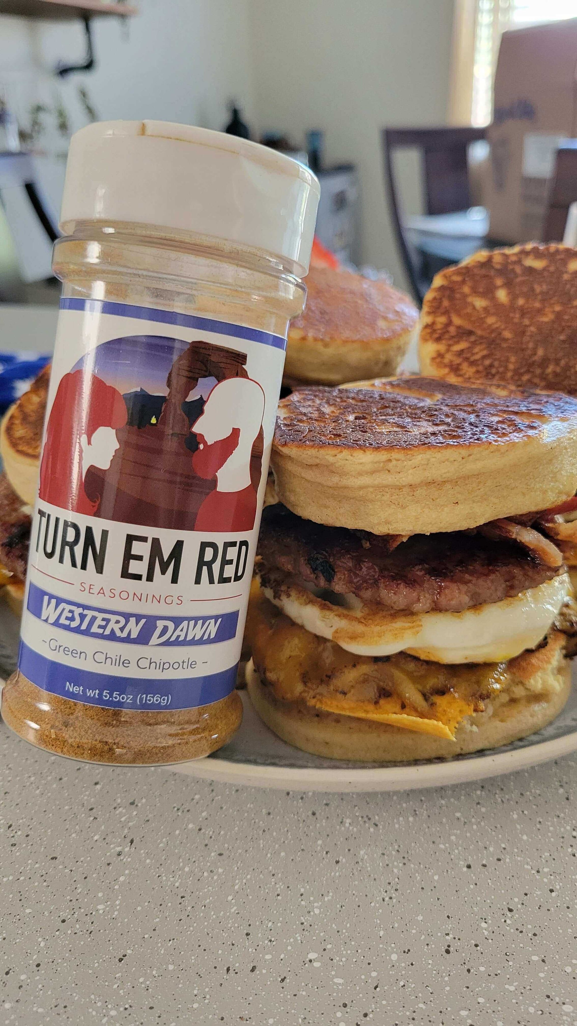 The All-American Stack Attack (Breakfast Sandwich Edition) featuring bacon and chipotle seasoning.