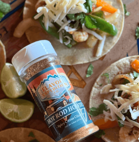 Hot Rod Howie’s Shrimp Tacos (Hold Onto Your Shells!) with spices and fresh ingredients on a vibrant plate.