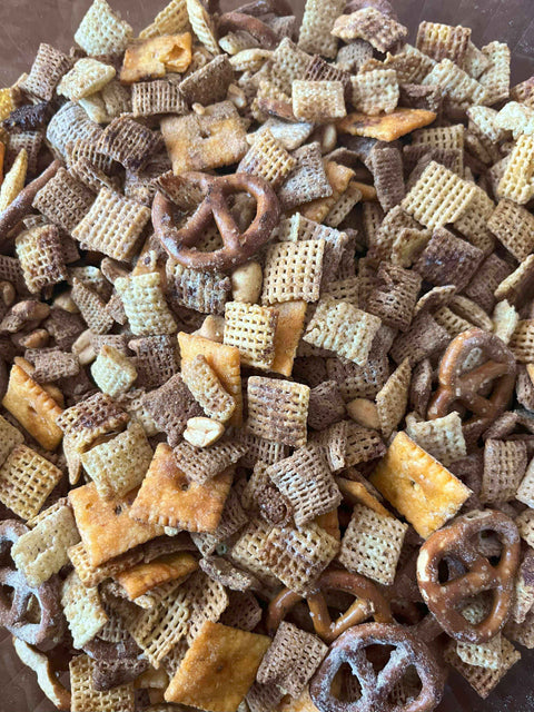 Snack Attack Supreme: Rosemary Red Pepper Parm Party Mix featuring a crunchy blend of pretzels, cereal, and crackers.
