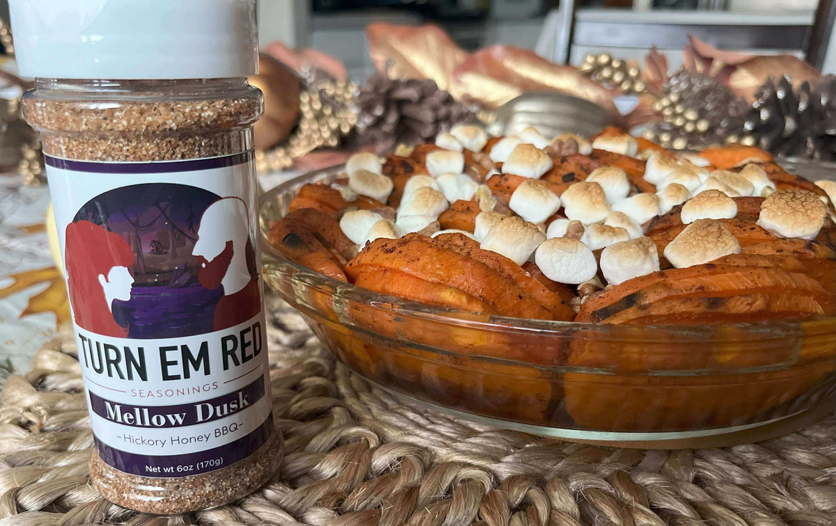 Scalloped Sweet Potato Pie topped with marshmallows and Mellow Dusk seasoning in a beautiful dish.