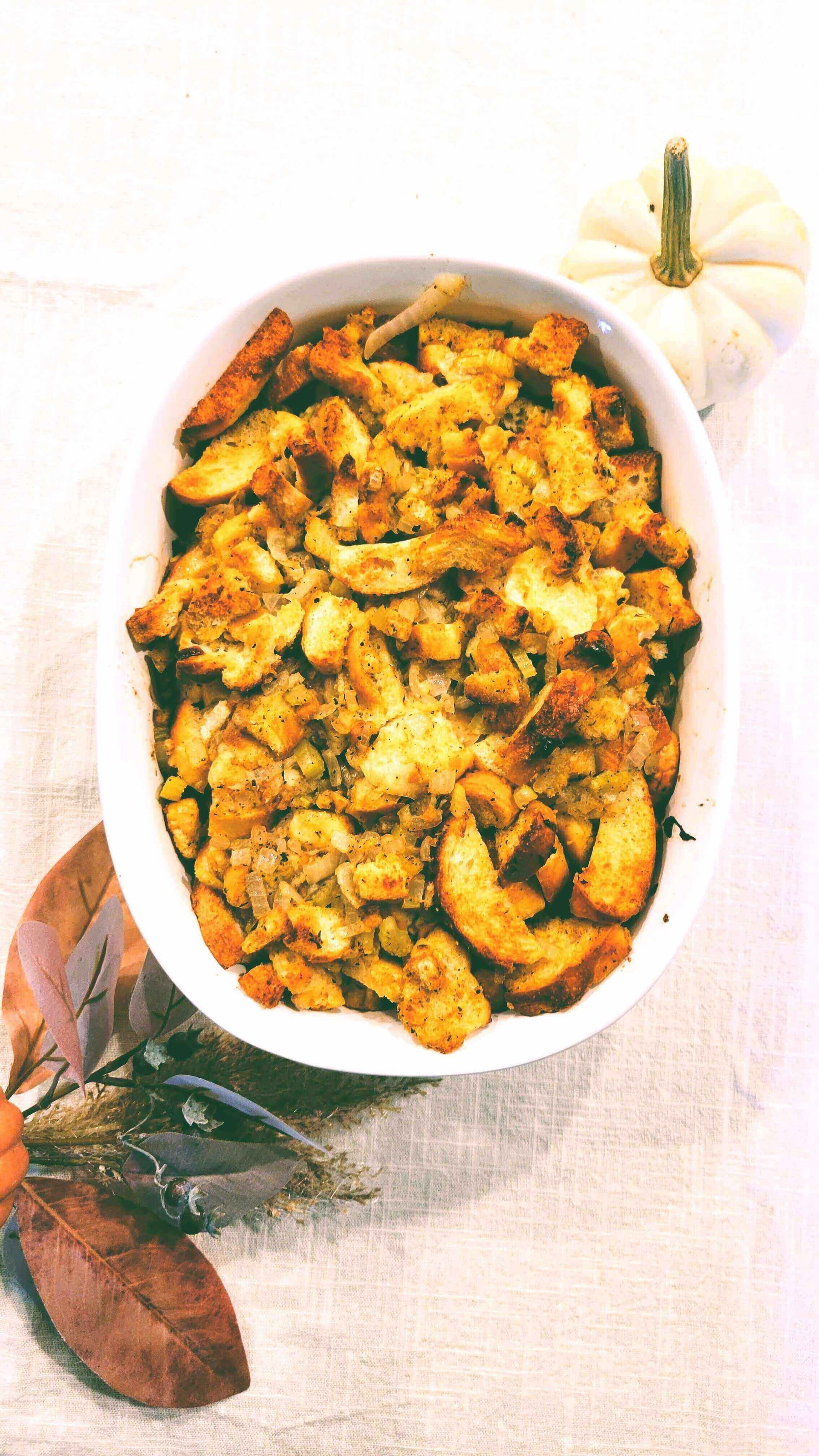 Tuscan Evening Herby Stuffing: Stuff Your Turkey (and Your Face!) in a baking dish, perfect for Thanksgiving dinner.
