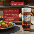 Jar of Flavor Expedition Co. seasoning with a taco dish and outdoor setting