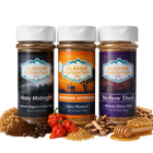 Three jars of Flavor Expedition Co. seasoning with ingredients on a white background