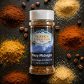 Spice jar labeled 'Hazy Midnight' by Flavor Expedition Co. on a dark surface with spices.