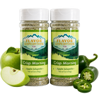 Two bottles of 'Crisp Morning' Apple Jalapeño seasoning from Flavor Expedition Co. with apples and jalapeños on a white background.