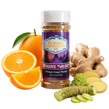 Jar of 'Dragon's Twilight' seasoning with oranges, ginger, and wasabi on a white background