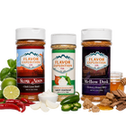 Three spice seasoning bottles from Flavor Expedition Co. are displayed on a white background with their corresponding flavor ingredients arranged around them.