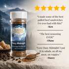 Bottle of Hazy Midnight seasoning with customer reviews and a mountainous background