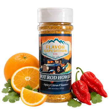 Spice jar labeled 'Hot Rod Howies' with oranges and peppers on a white background