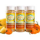 Three jars of 'Island Sunrise' seasoning from Flavor Expedition Co. with pineapples and habanero peppers on a white background.