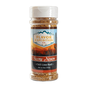 Chili Lime Basil Seasoning from Slow Noon in a clear bottle with colorful label, perfect for adding flavor to dishes.