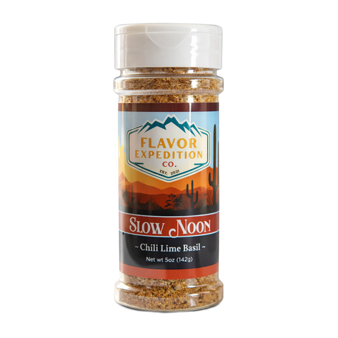 Chili Lime Basil Seasoning from Slow Noon in a clear bottle with colorful label, perfect for adding flavor to dishes.