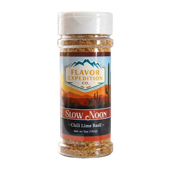Chili Lime Basil Seasoning from Slow Noon in a clear bottle with colorful label, perfect for adding flavor to dishes.