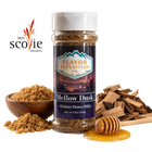 A bottle of Flavor Expedition Co. Mellow Dusk Hickory Honey BBQ seasoning stands centered on a white background, surrounded by ingredients including a wooden bowl of brown sugar, wood chips, and a honey dipper with honey. [pack-1]