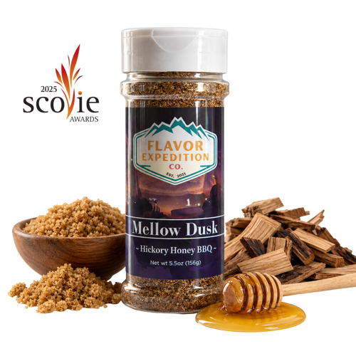 Mellow Dusk seasoning bottle beside brown sugar and hickory chips with a Scovie Awards logo. [pack-1]