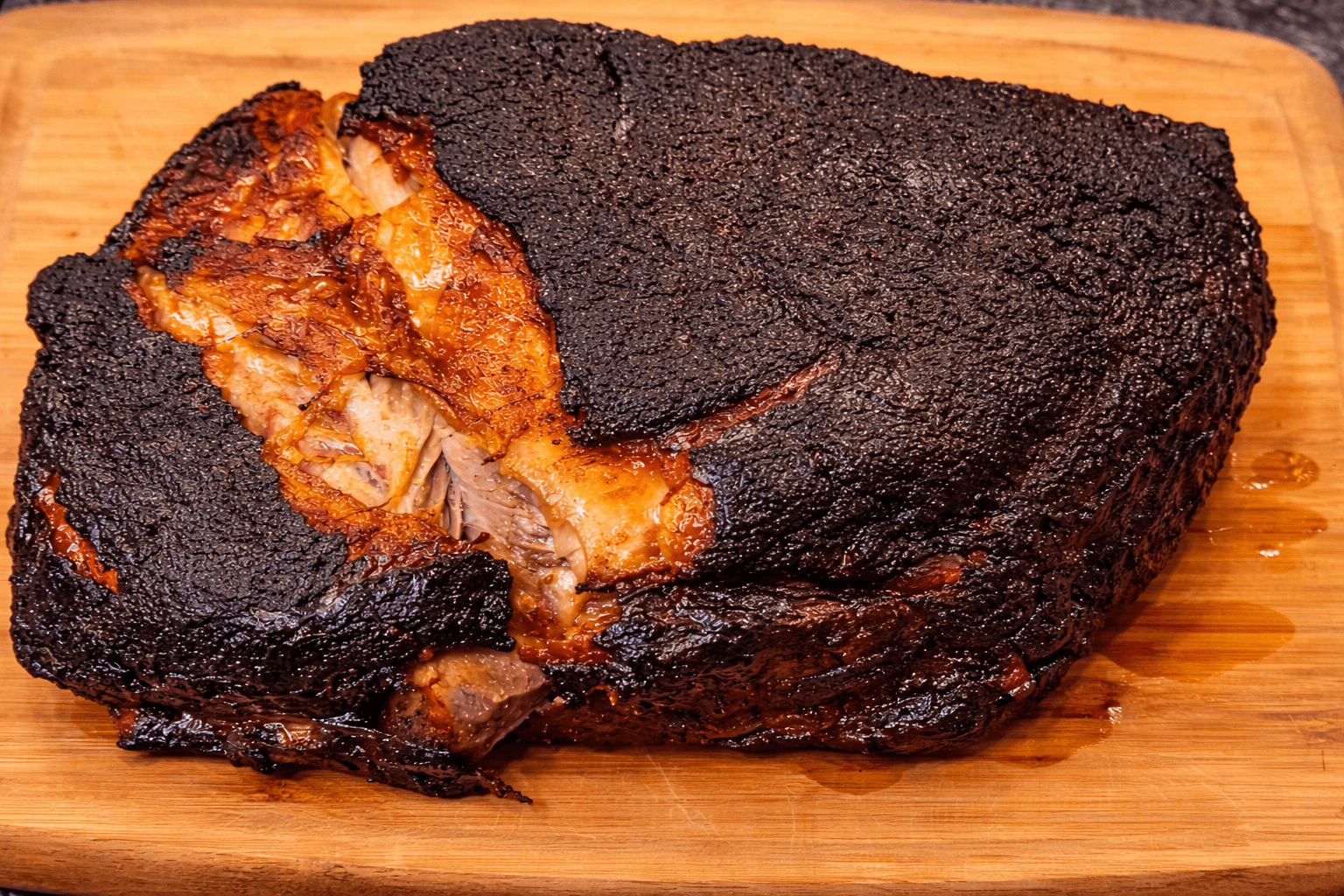 Smoked meat on a wooden cutting board