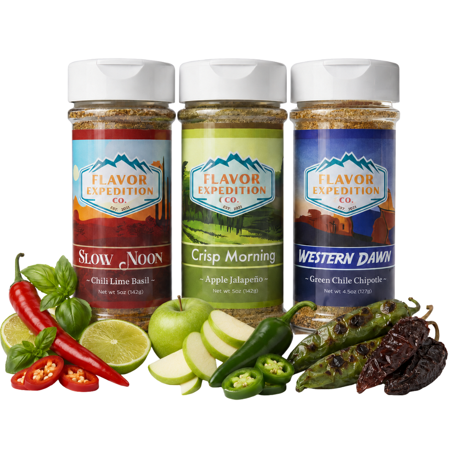 Three jars of Flavor Expedition Co. spices with ingredients like peppers and apples on a white background