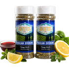 Two jars of 'Tuscan Evening' tangy herb seasoning from Flavor Expedition Co. with lemons and herbs on a white background.