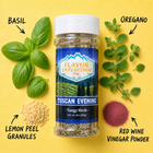 Spice jar labeled 'Tuscan Evening' with basil, oregano, lemon peel granules, and red wine vinegar powder on a yellow background.