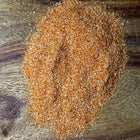 Brown sugar on a wooden surface