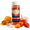 Spice jar labeled 'Flavor Expedition Co. Volcanic Sunset' with peppers, garlic, and honey on a white background