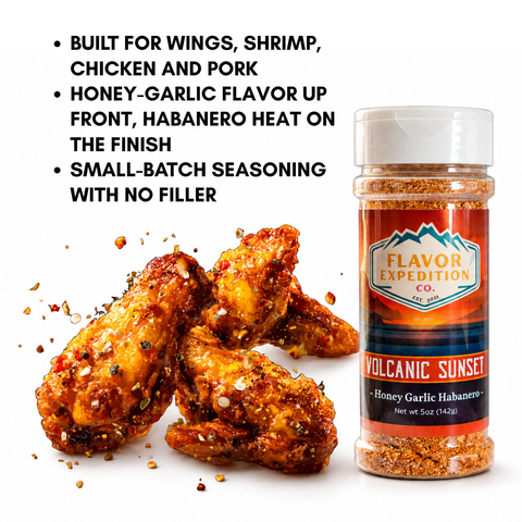 Spice jar labeled 'Flavor Expedition Co.' with wings seasoned with the product on a white background