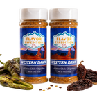 Two bottles of Flavor Expedition Co. Western Dawn Green Chile Chipotle seasoning with peppers and chilies on a white background.