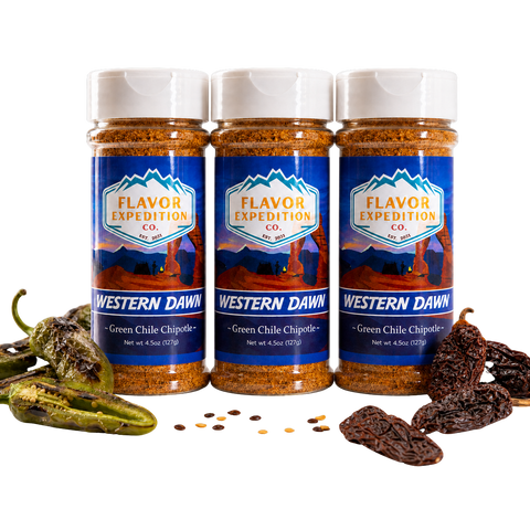 Three bottles of Flavor Expedition Co. Western Dawn Green Chile Chipotle seasoning with peppers and raisins on a white background.