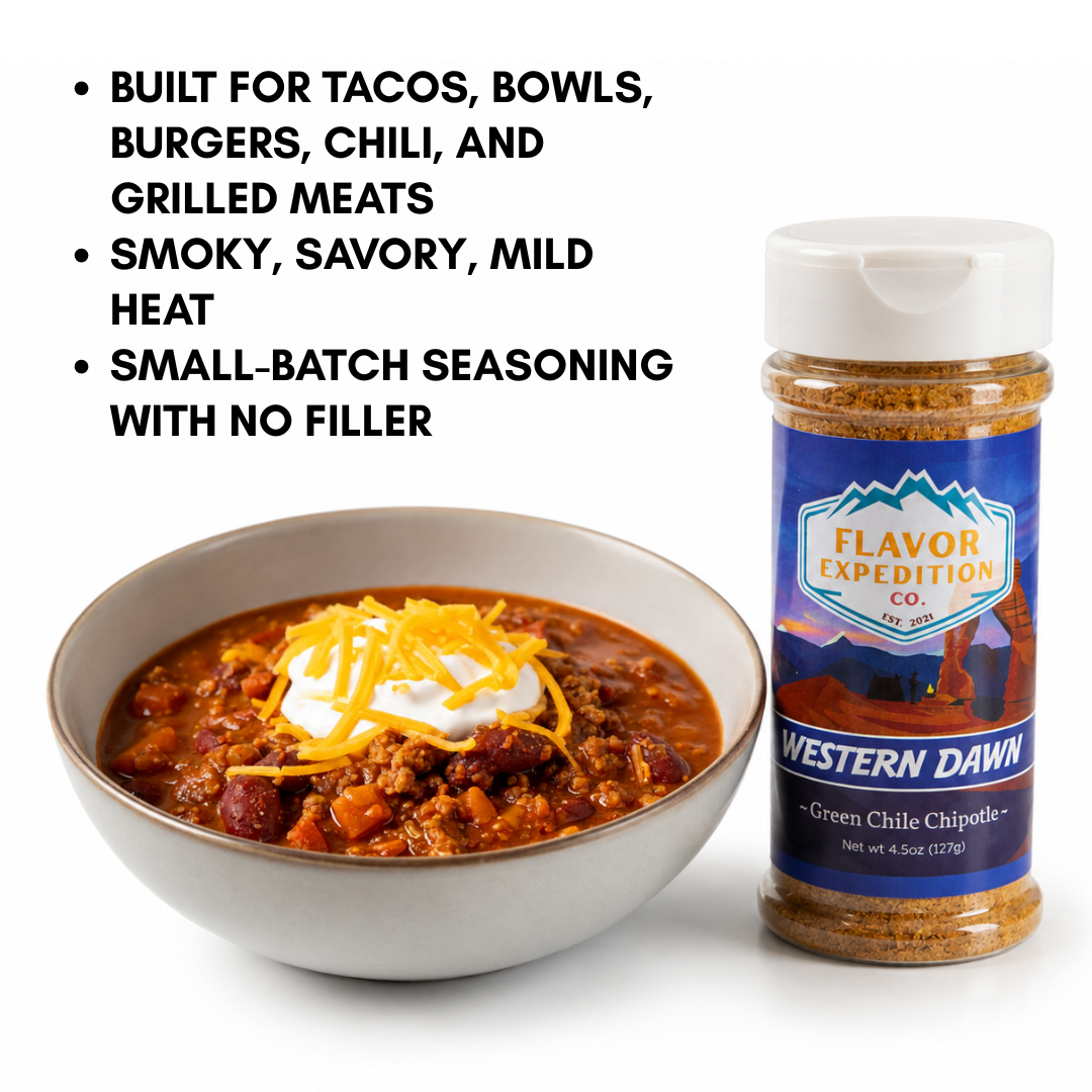 Green Chile Chipotle Seasoning by Western Dawn next to a bowl of chili, enhancing smoky and savory flavors.