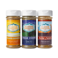 Catch of the Day seasoning pack featuring Island Sunrise, Tuscan Evening, and Slow Noon spices in jars.